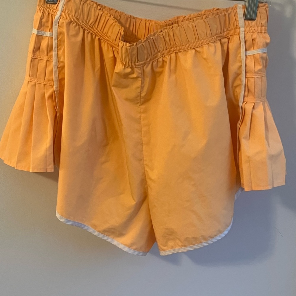 FP Movement Orange High Waist Shorts with Flowy Design